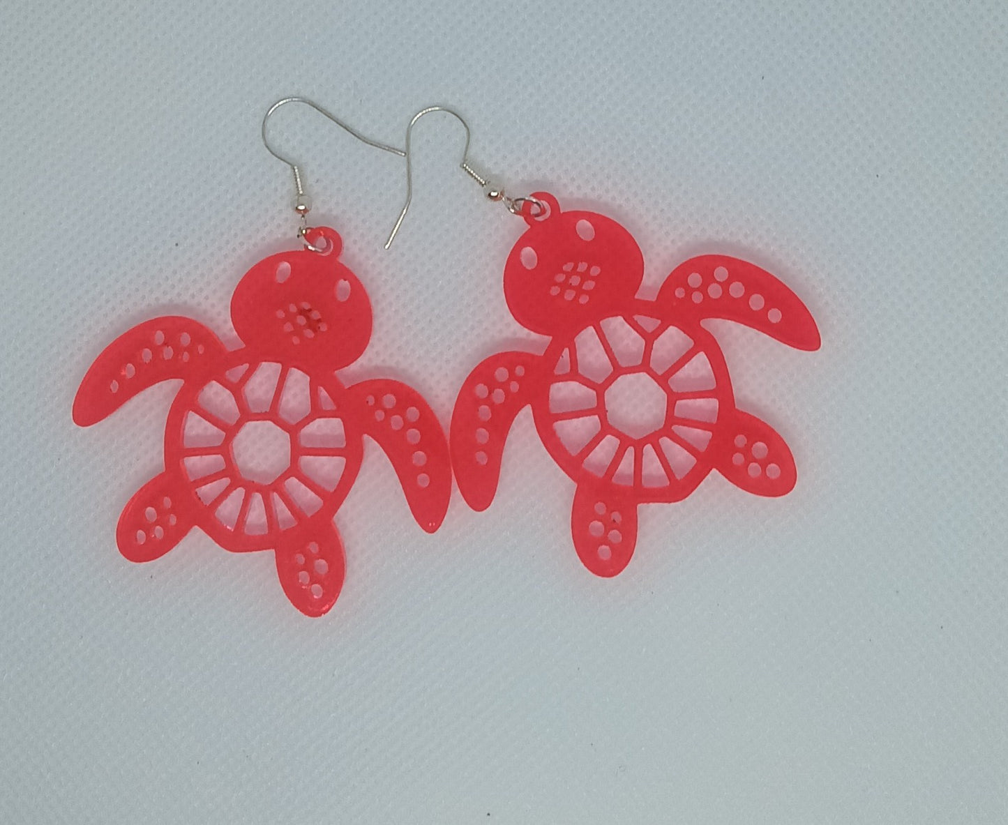 Turtle Design acrylic earrings.