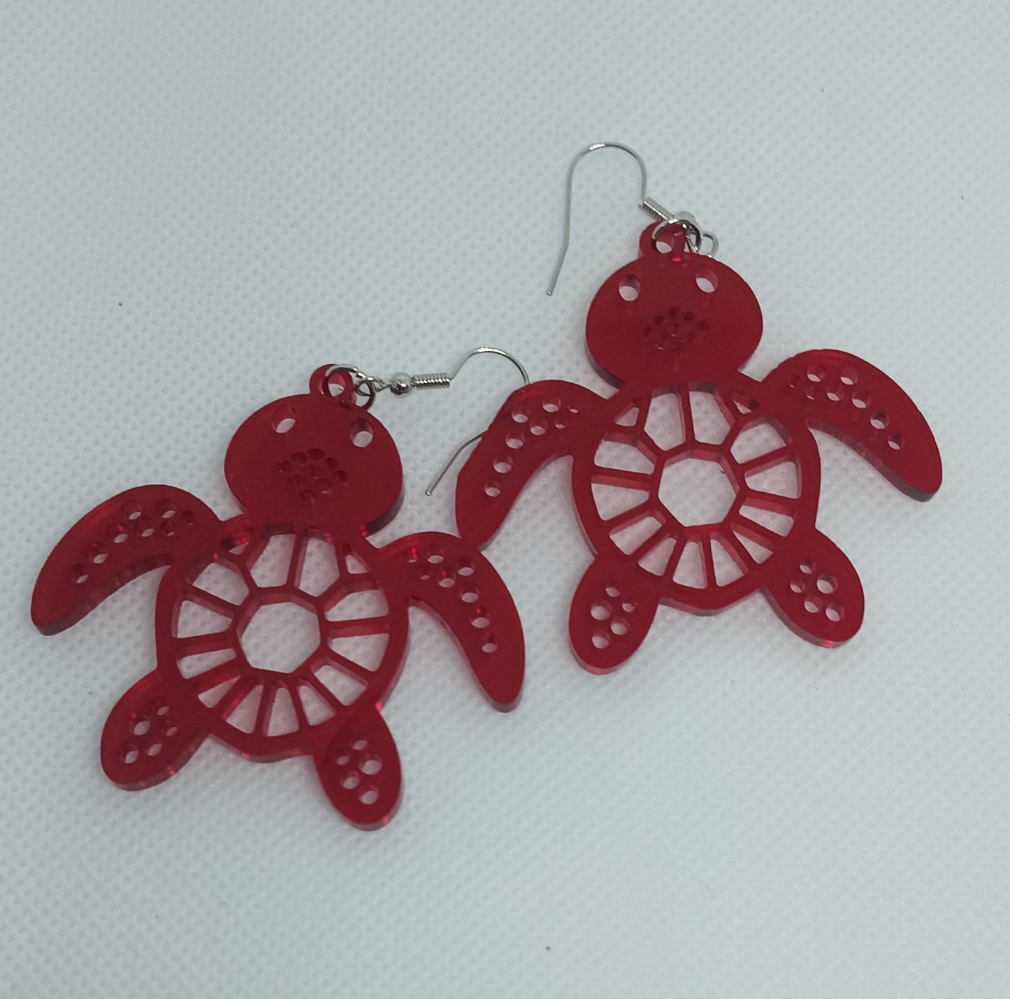 Turtle Design acrylic earrings.