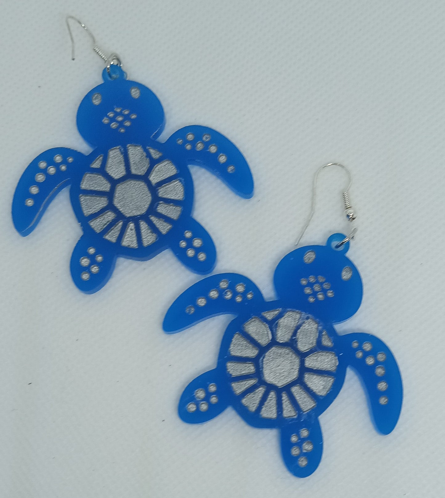 Turtle Design acrylic earrings.