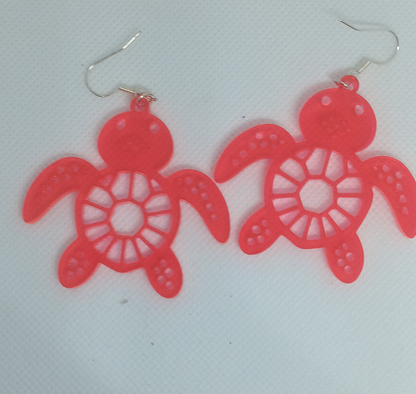 Turtle Design acrylic earrings.